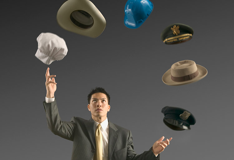 Businessman-Juggling-Hats-750-crop